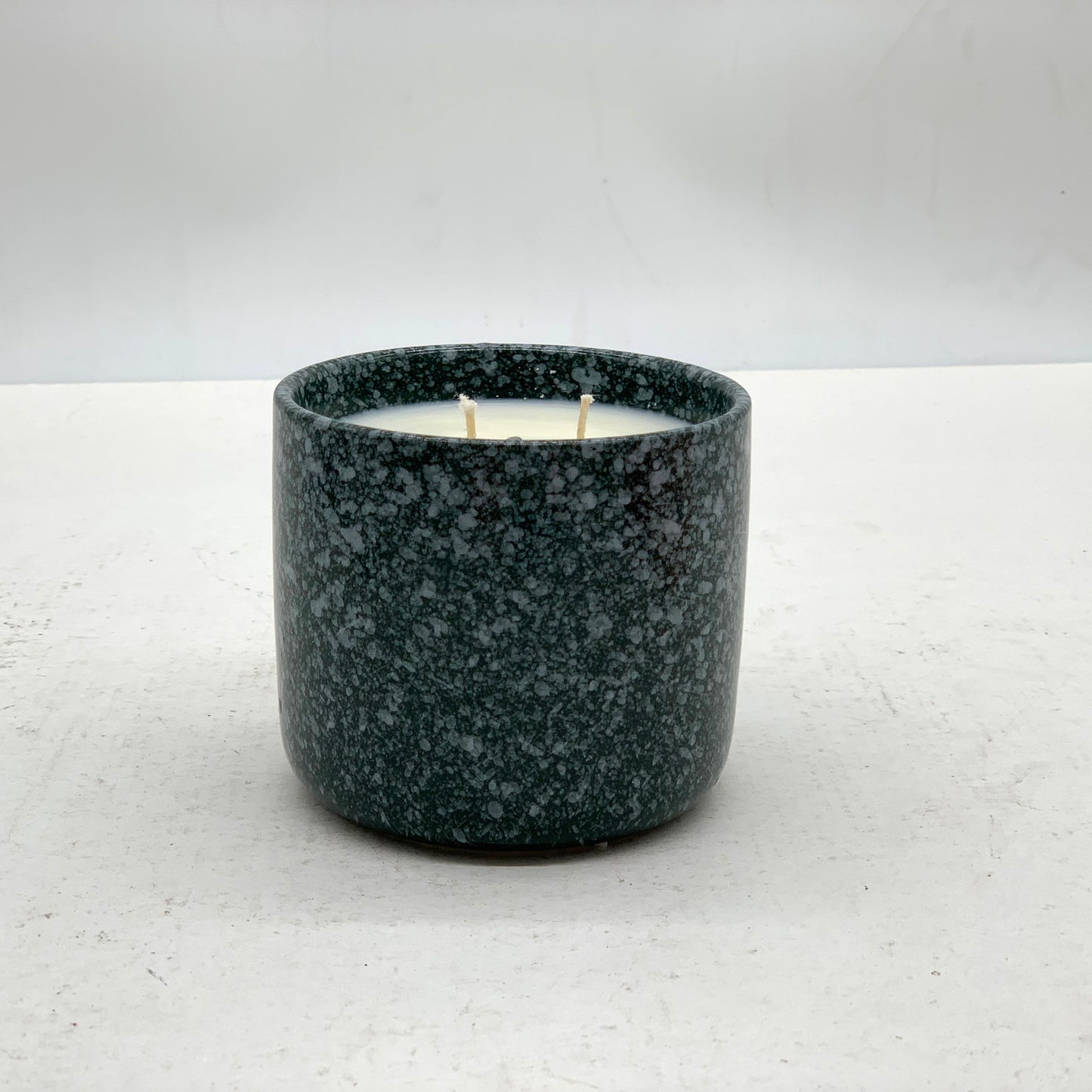 Ember Glow - 3.88" Spotted Vase Ceramic Candle in Forest Green